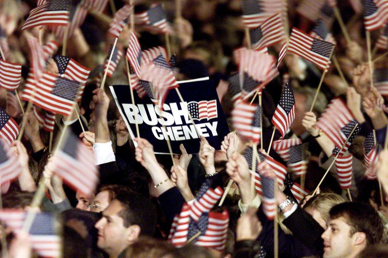 &copy; Reuters. FILE PHOTO: Republican supporters react after tv networks announced that Texas Governor George W. Bush won the U.S. election in Austin