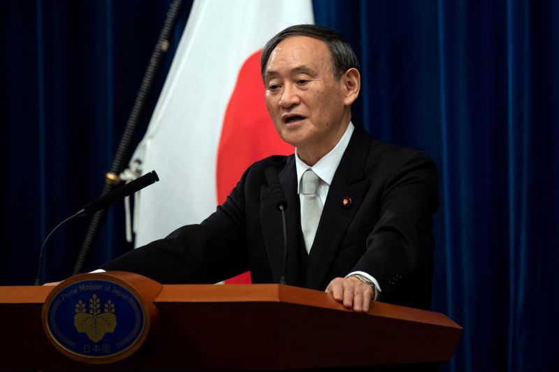 &copy; Reuters. FILE PHOTO: FILE PHOTO: Yoshihide Suga speaks during a news conference following his confirmation as Prime Minister of Japan in Tokyo