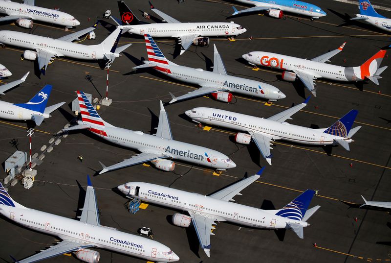 &copy; Reuters. FILE PHOTO: FILE PHOTO: Grounded Boeing 737 MAX aircraft are seen parked at Boeing Field in Seattle