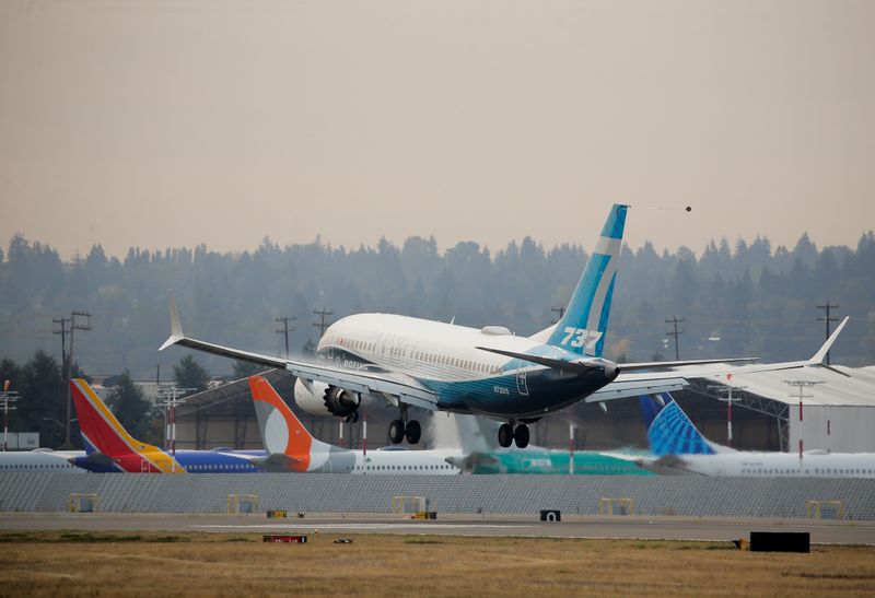 &copy; Reuters. FILE PHOTO: A Boeing 737 MAX aircraft lands during an evaluation flight in Seattle