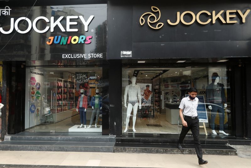 &copy; Reuters. A man walks out of a Jockey outlet in Mumbai
