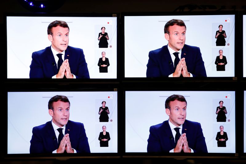 &copy; Reuters. French President Emmanuel Macron speaks on national television