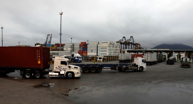 &copy; Reuters. Trucks lineup at Brasil Terminal Portuario at the Port of Santos in Santos