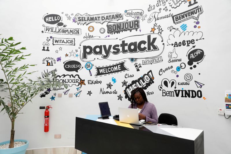 © Reuters. FILE PHOTO: A staff member works at the reception of the paystack online payment company in the government reserved area in Ikeja, in Lagos