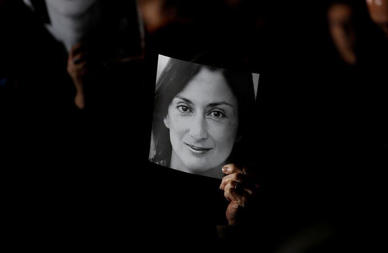 © Reuters. FILE PHOTO: Demonstration to demand justice over the murder of journalist Daphne Caruana Galizia outside the Office of the Prime minister at Auberge de Castle, in Valletta