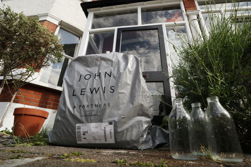 &copy; Reuters. An online delivery package from British retailer John Lewis Partnership is seen on the doorstep of a home in London