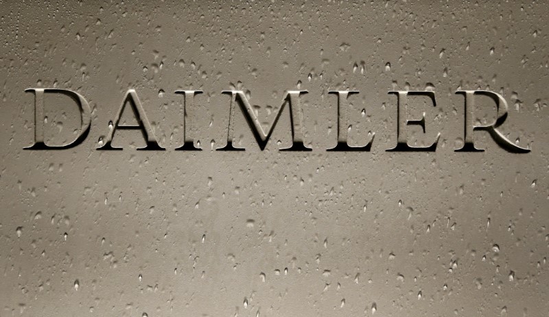 &copy; Reuters. FILE PHOTO: Daimler AG sign with raindrops is pictured before the company&apos;s 2016 annual news conference in Stuttgart