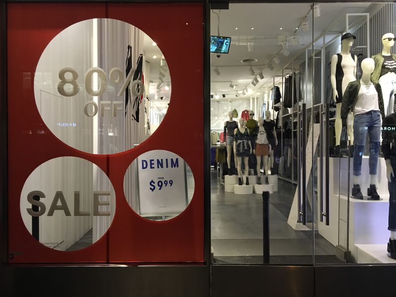 &copy; Reuters. tAn H&amp;M store has sale signs in the window in New York City