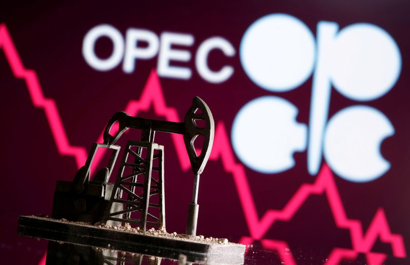 &copy; Reuters. A 3D printed oil pump jack is seen in front of displayed stock graph and Opec logo in this illustration picture