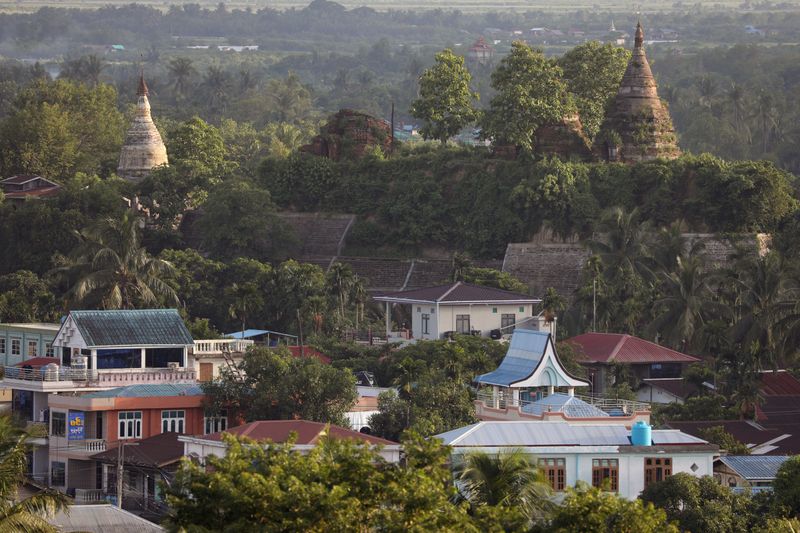 &copy; Reuters. FILE PHOTO: Landscape view of downtown with ancient pagodas in the background in Mrauk U