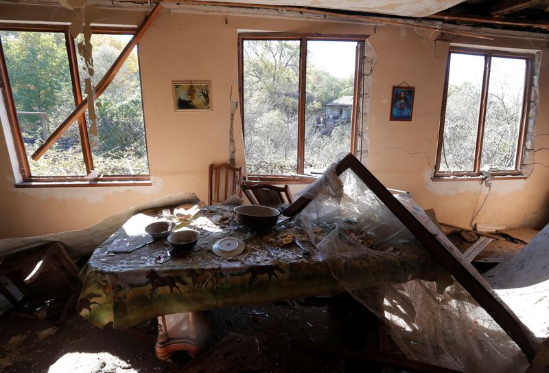 &copy; Reuters. An interior view shows a damaged house following recent shelling in Shosh