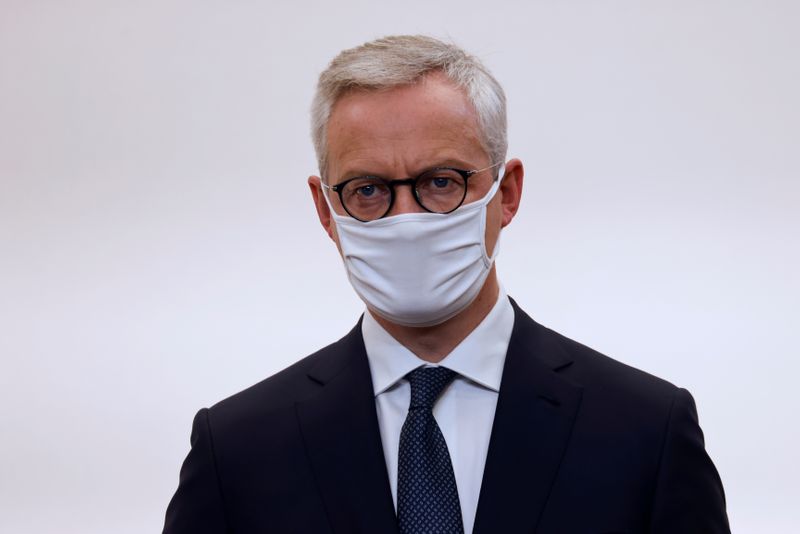 &copy; Reuters. French Economy and Finance Minister Bruno Le Maire wears a face mask during a press conference in Paris