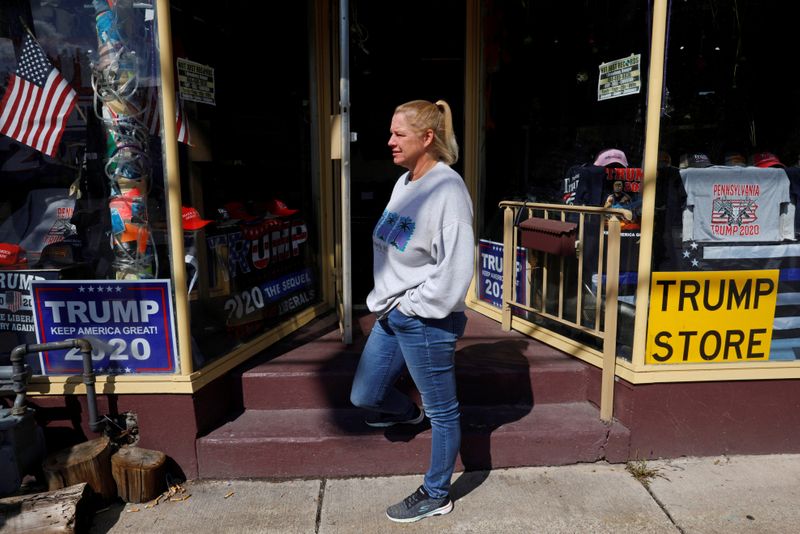 © Reuters. Darlene Stolz stands outside the Trump Store in Bangor