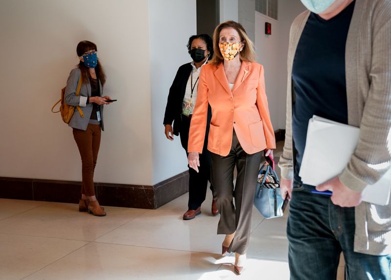 © Reuters. FILE PHOTO: U.S. House Speaker Pelosi departs a news conference on Capitol Hill in Washington