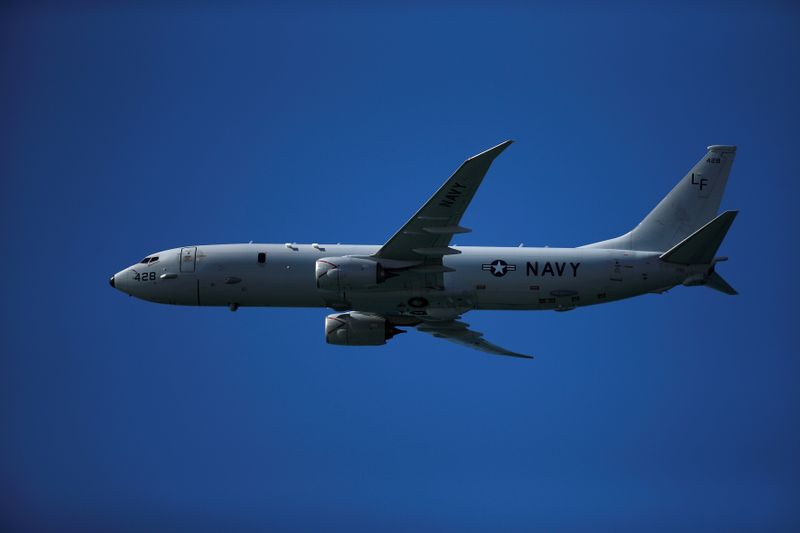 © Reuters. FILE PHOTO: FILE PHOTO: A Boeing P-8 Poseidon aircraft from the U.S. Navy fly during an international aerial and naval military exhibition in Rota