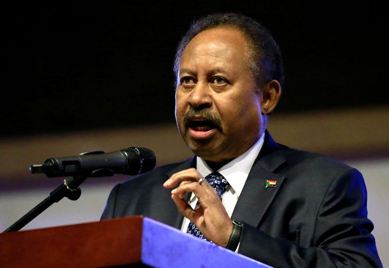 &copy; Reuters. FILE PHOTO: Sudan&apos;s Prime Minister in the transitional government Abdalla Hamdok addresses people as they celebrate the first anniversary of the start of the uprising that toppled long-time ruler Omar al-Bashir, at the Friendship Hall in Khartoum