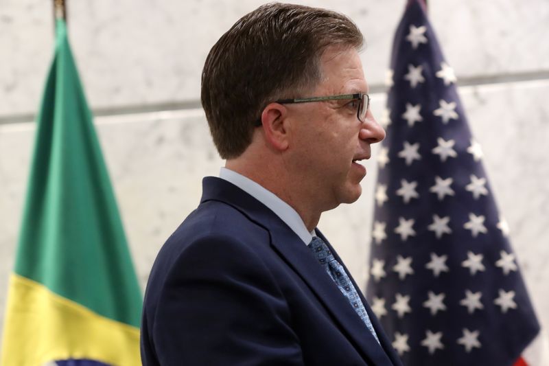 &copy; Reuters. U.S. Ambassador Todd Chapman walks between flags during a meeting at Sao Paulo&apos;s Industries Federation in Sao Paulo