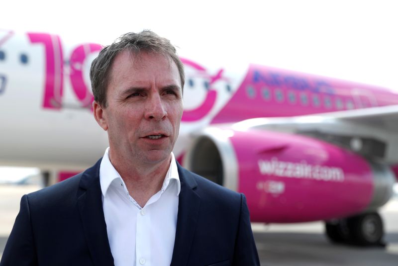 © Reuters. FILE PHOTO: CEO of Wizz Air, Jozsef Varadi speaks during the unveiling ceremony of the 100th plane of its fleet at Budapest Airport