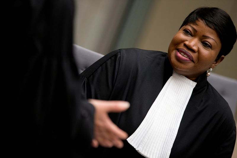 © Reuters. FILE PHOTO: Public Prosecutor Fatou Bensouda, waits for a defendant to enter the court room for his initial appearance on charges of war crimes and crimes against humanity at the ICC in The Hague