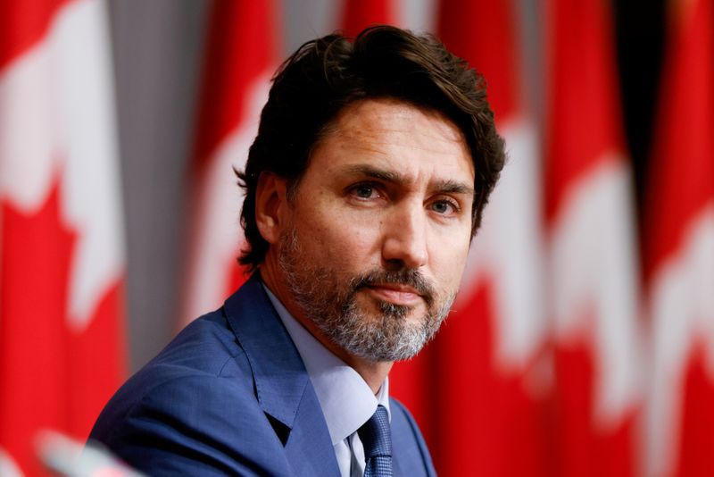 &copy; Reuters. FILE PHOTO: FILE PHOTO: Canada&apos;s Prime Minister Justin Trudeau takes part in a news conference on Parliament Hill in Ottawa