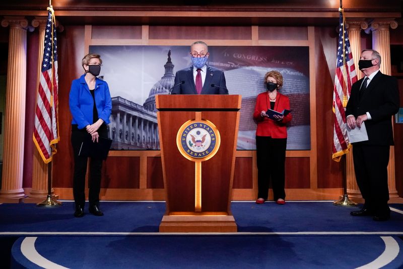 © Reuters. Senate Minority Leader Schumer and other Democratic Senators participate in a press conference at the U.S. Capitol in Washington