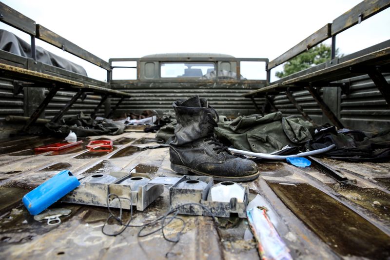 &copy; Reuters. A military boot is seen at an Armenian military truck which was seized by the Azerbaijan army during the fighting over the breakaway region of Nagorno-Karabakh, near the city of Barda