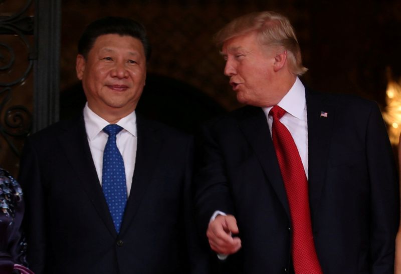 &copy; Reuters. FILE PHOTO: U.S. President Trump talks with Chinese President Xi as he welcomes Xi to the United States