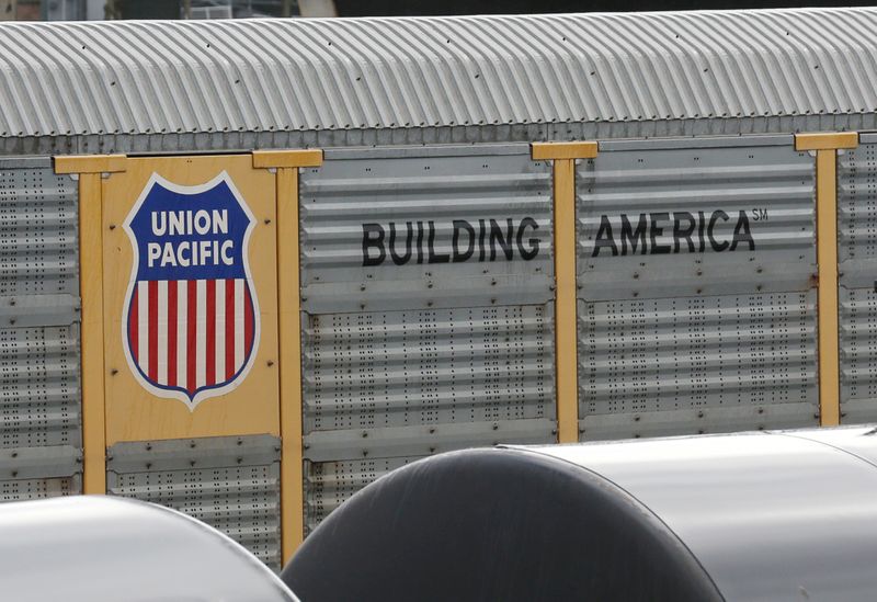 © Reuters. A Union Pacific rail car is parked at a Burlington National Santa Fe (BNSF) train yard in Seattle