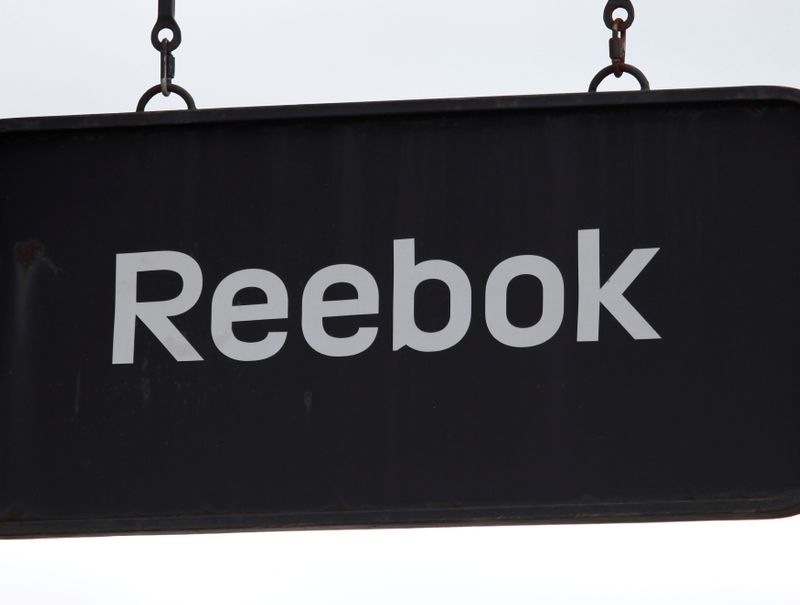 &copy; Reuters. FILE PHOTO: A board with Reebok store logo is seen on a shopping center at the outlet village Belaya Dacha outside Moscow