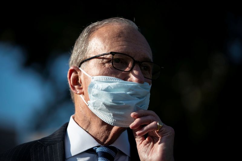 &copy; Reuters. White House chief economic adviser Larry Kudlow speaks to reporters following a television interview, outside the White House i