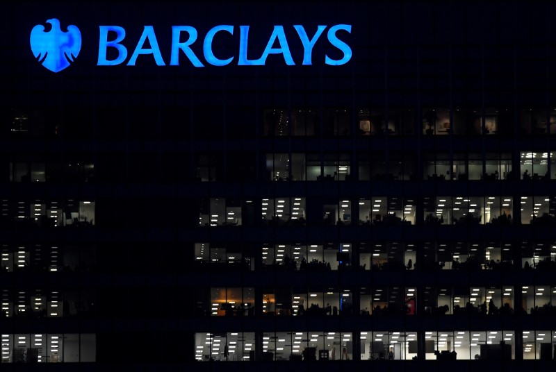 &copy; Reuters. FILE PHOTO: Workers are seen in at Barclays bank offices in the Canary Wharf financial district in London