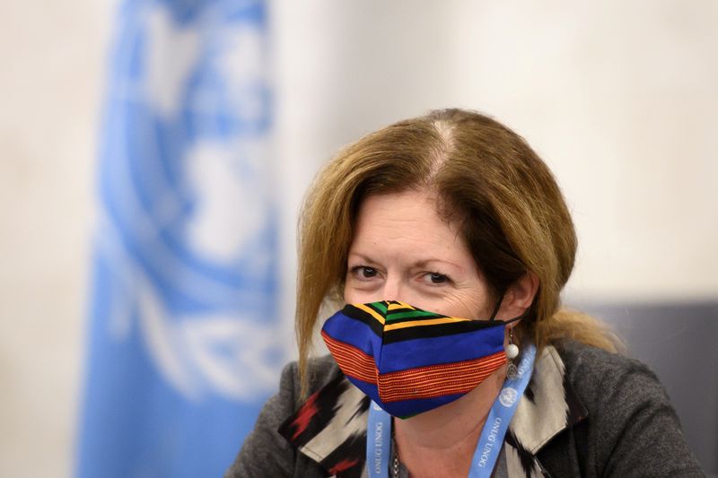 © Reuters. FILE PHOTO: Deputy Special Representative of the UN Secretary-General for Political Affairs in Libya Stephanie Williams wearing a face mask attends the talks between the rival factions in the Libya conflict at the United Nations offices in Geneva