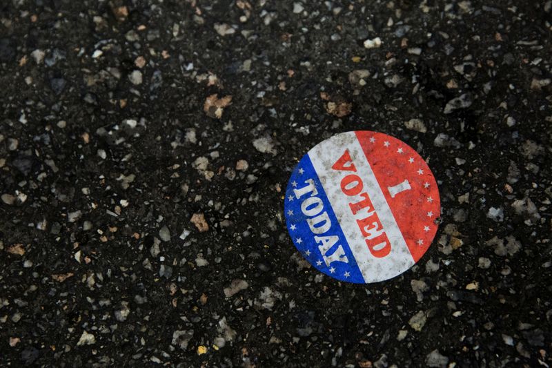 &copy; Reuters. An &quot;I voted today&quot; sticker is seen on the ground at Philadelphia&apos;s City Hall, an early voting location for the upcoming presidential election, in Philadelphia, Pennsylvania