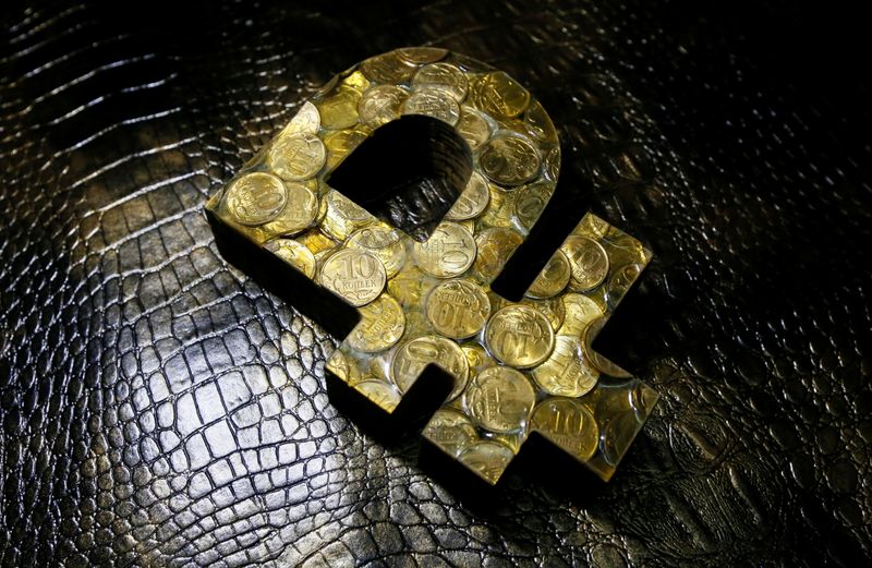 &copy; Reuters. A view shows an artwork depicting the sign of the Russian rouble in Krasnoyarsk