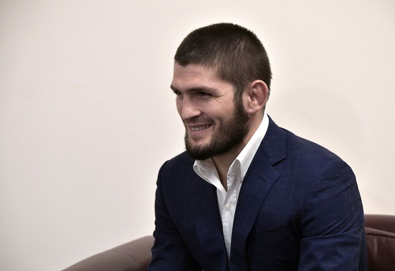 &copy; Reuters. Russian mixed martial arts fighter Nurmagomedov meets with President Putin in Makhachkala