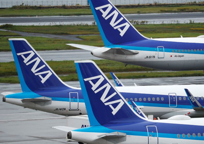 &copy; Reuters. All Nippon Airways (ANA) aircrafts are seen amid the coronavirus disease (COVID-19) outbreak Haneda Airport in Tokyo