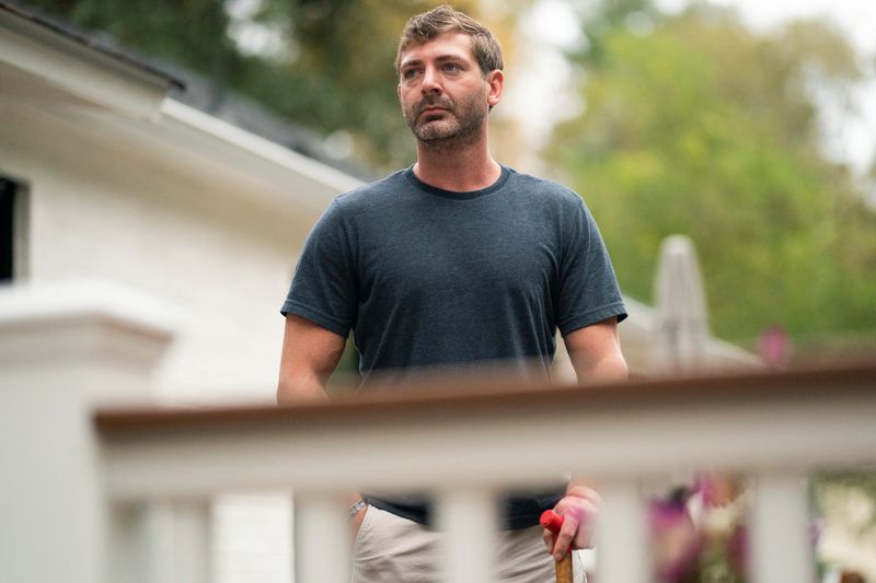 &copy; Reuters. Retired Army Captain Dan Berschinski poses for a portrait at his home in Atlanta