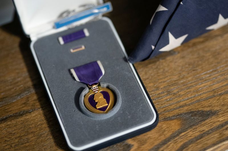 © Reuters. Retired Army Captain Dan Berschinski's Purple Heart is seen on a shelf at his home in Atlanta, Georgia