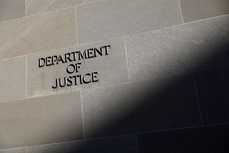 © Reuters. Signage is seen at the United States Department of Justice headquarters in Washington, D.C.