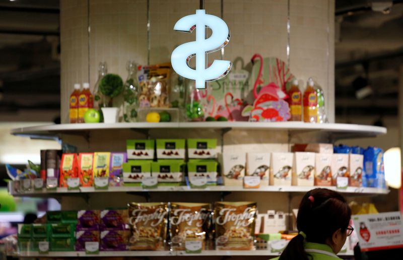 &copy; Reuters. FILE PHOTO: Goods are displayed in front of a cashier at a supermarket in Hong Kong