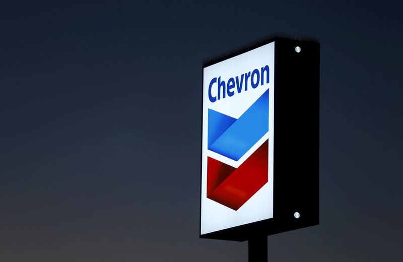 &copy; Reuters. FILE PHOTO: FILE PHOTO: A Chevron gas station sign in Cardiff, California