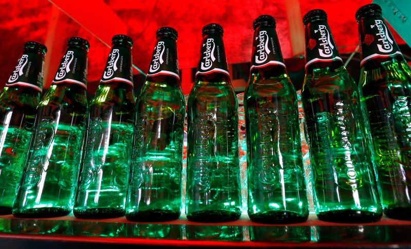&copy; Reuters. Bottles of Carlsberg beer are seen in a bar in St. Petersburg