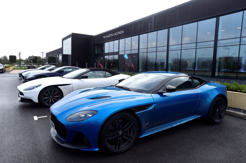 © Reuters. FILE PHOTO: Aston Martin Lagonda cars parked outside the carmaker's factory in St Athan, Wales