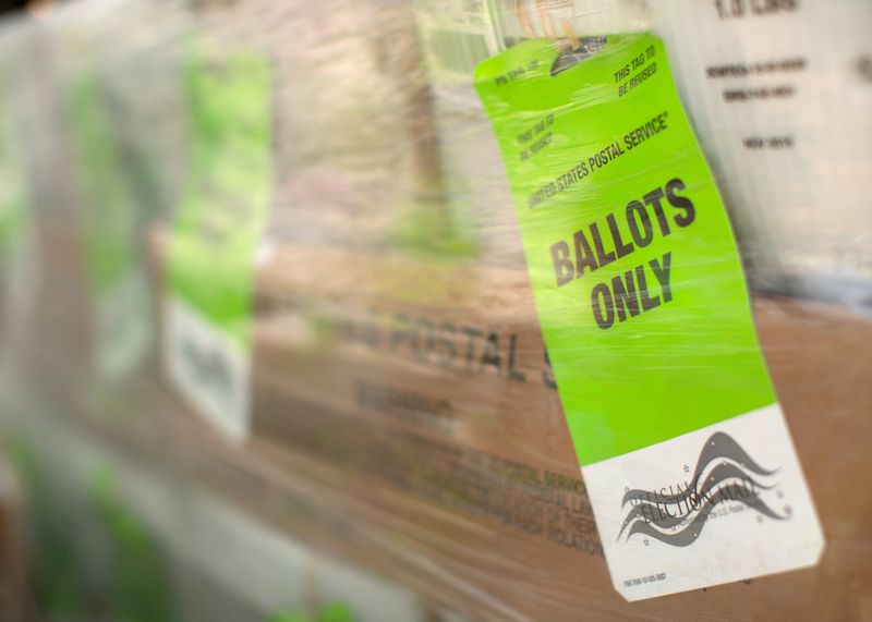 &copy; Reuters. FILE PHOTO: Mail-in Ballots shipped from Orange County Registrar of Voters to U.S. Post Office for delivery