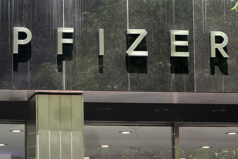 &copy; Reuters. FILE PHOTO: A Pfizer sign is pictured at their Headquarters in the Manhattan borough of New York City