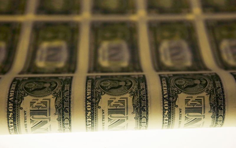 &copy; Reuters. A sheet of United States one dollar bills is seen on a light table during production at the Bureau of Engraving and Printing in Washington