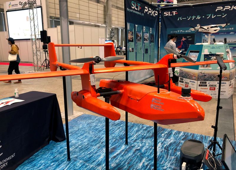 &copy; Reuters. FILE PHOTO: An unmanned flying boat named &apos;HAMADORI&apos; is displayed at Japan Drone 2020 exhibition in Chiba, Japan