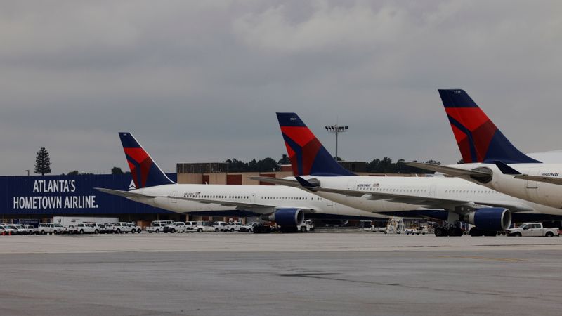 &copy; Reuters. Delta Air Lines planes are parked at their gates in Atlanta