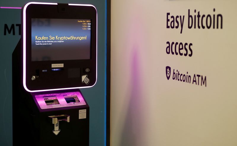 &copy; Reuters. FILE PHOTO: &quot;Buy cryptocurrencies&quot; is seen on the display of a cryptocurrency ATM at the headquarters of Swiss Falcon Private Bank in Zurich