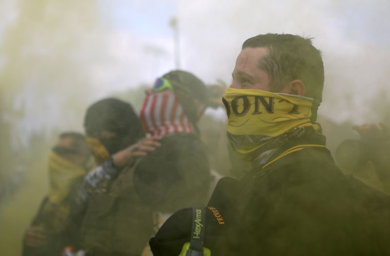 &copy; Reuters. FILE PHOTO: Members of Proud Boys gather for a rally in Portland